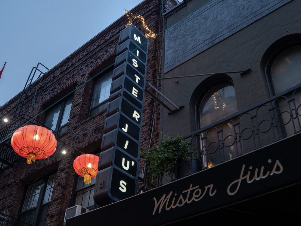 Mister Jiu's — exterior neon sign in Chinatown